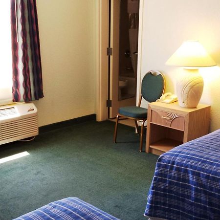 Cocoa Beach Suites Hotel Værelse billede