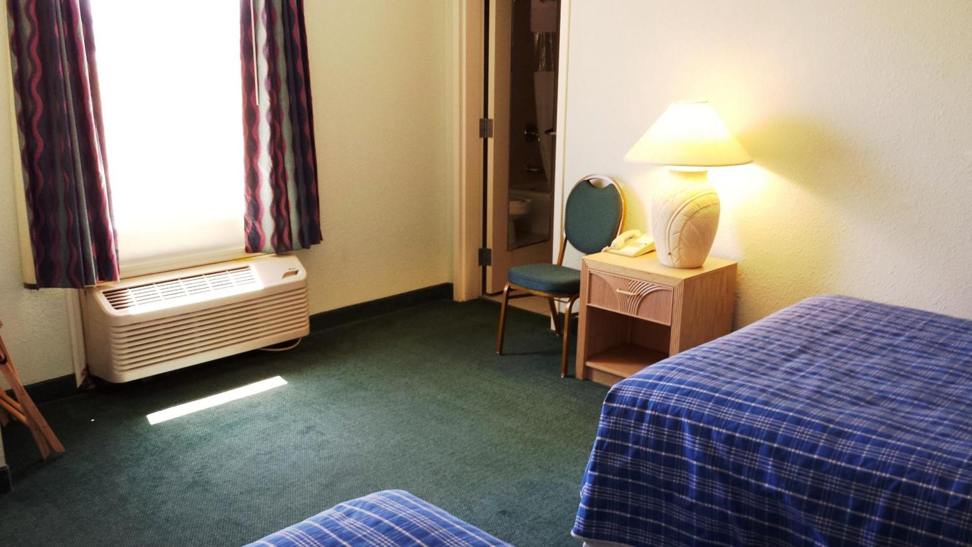 Cocoa Beach Suites Hotel Værelse billede